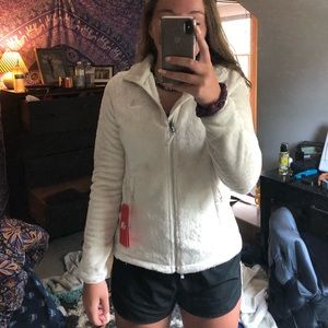 white, fuzzy, north face jacket